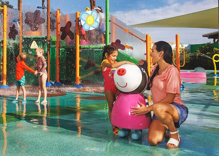 playing kids on Muddy Puddles Splash Pad